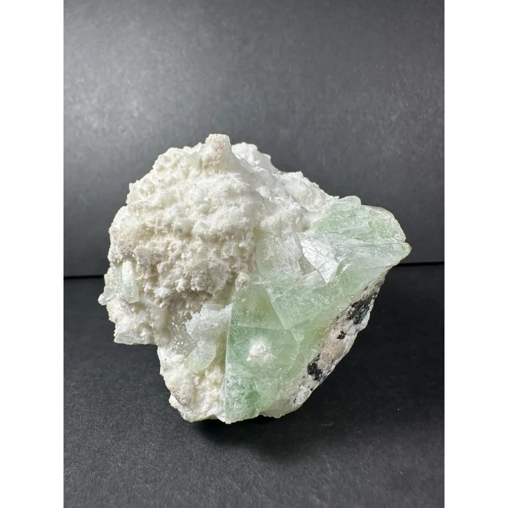 Stunning green apophyllite crystal cluster from India with fluorite