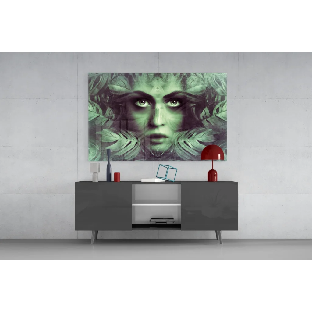 Modern gray sideboard with sleek silver legs under stunning green leafy wall art