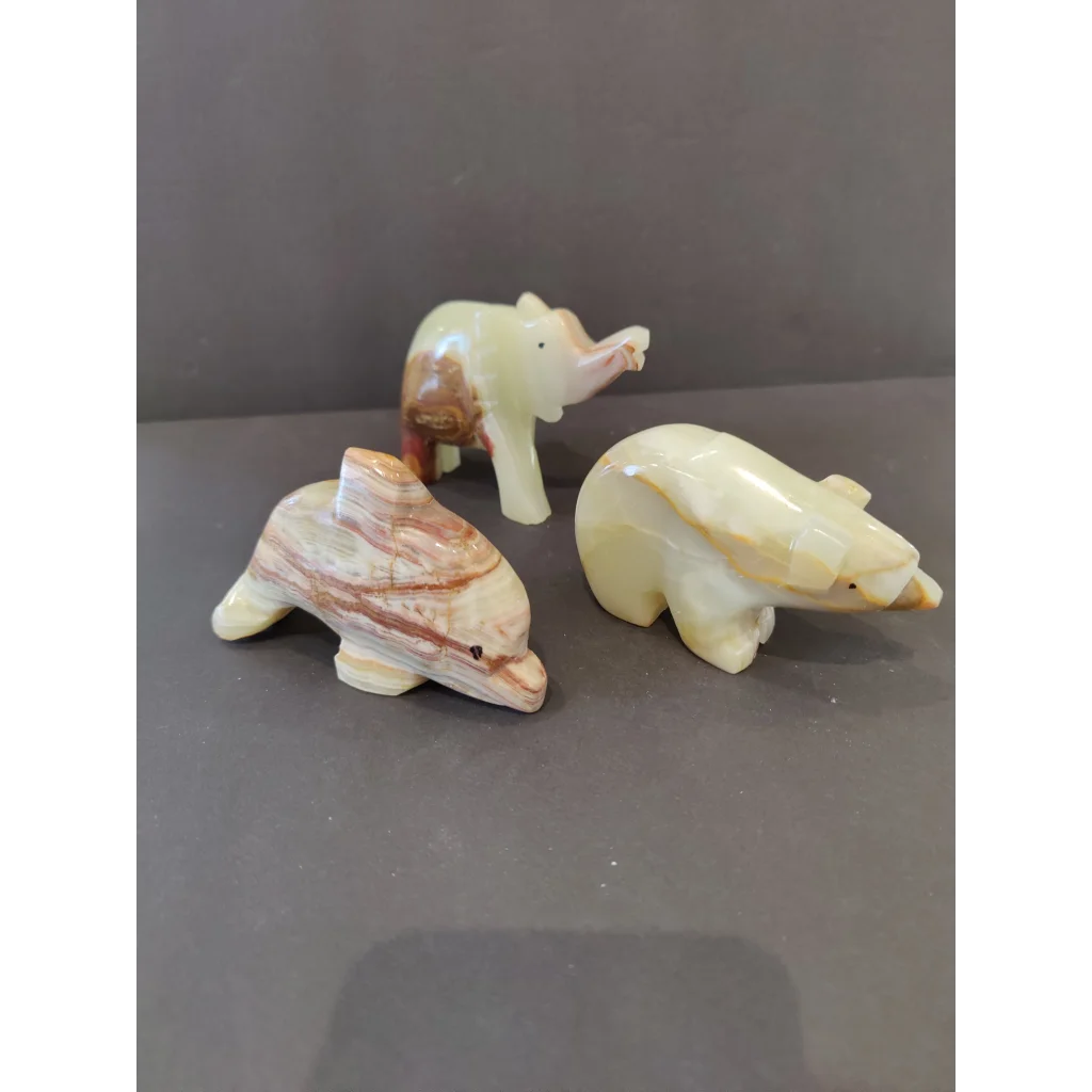 Stunning green onyx animal figurine set with dolphin, elephant, bear