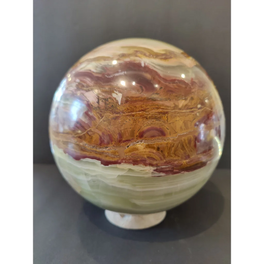Stunning green onyx sphere with onyx display stand from Pakistan