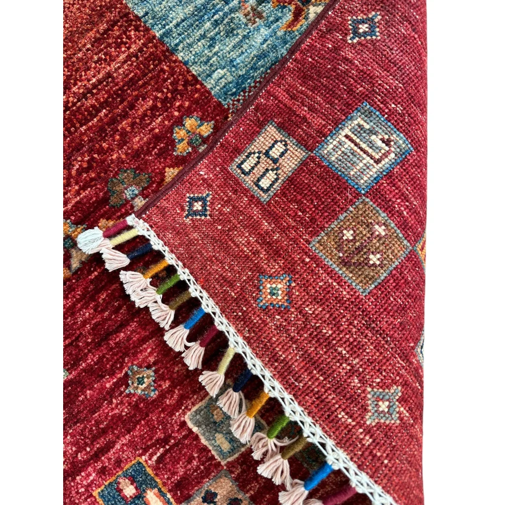 Stunning hand-knotted Afghan Ghazni wool tribal rug with red geometric patterns