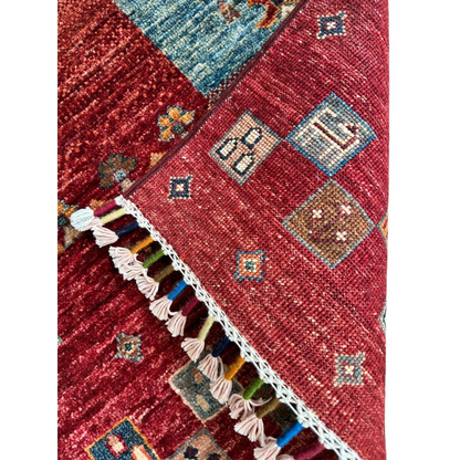 Stunning hand-knotted Afghan Ghazni wool tribal rug with red geometric patterns