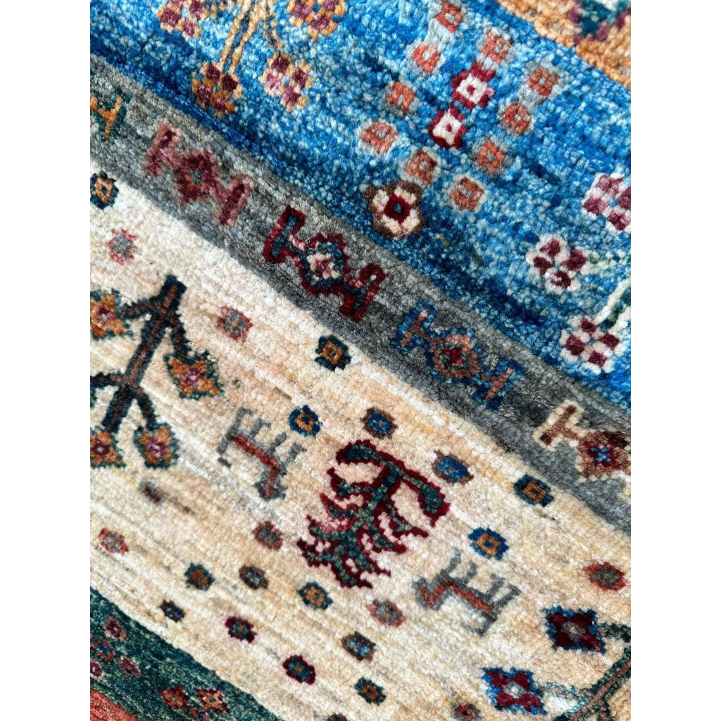 Stunning hand-knotted Afghan Ghazni wool tribal rug with geometric floral patterns