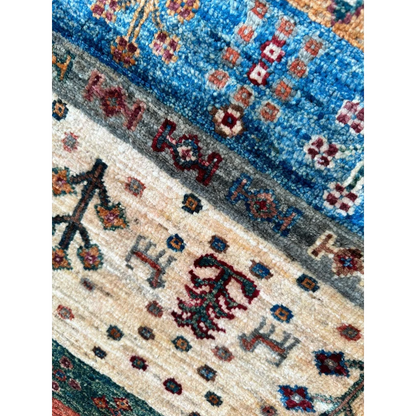Stunning hand-knotted Afghan Ghazni wool tribal rug with geometric floral patterns