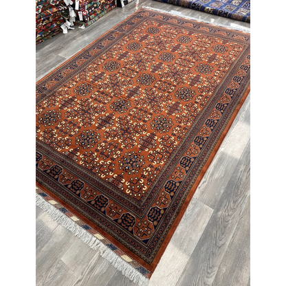Stunning Afghani Bukharayi rug in orange, blue geometric patterns