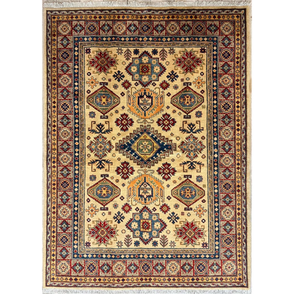 Hand-knotted Afghan Kazak rug in beige with intricate geometric patterns in red, blue, green and orange