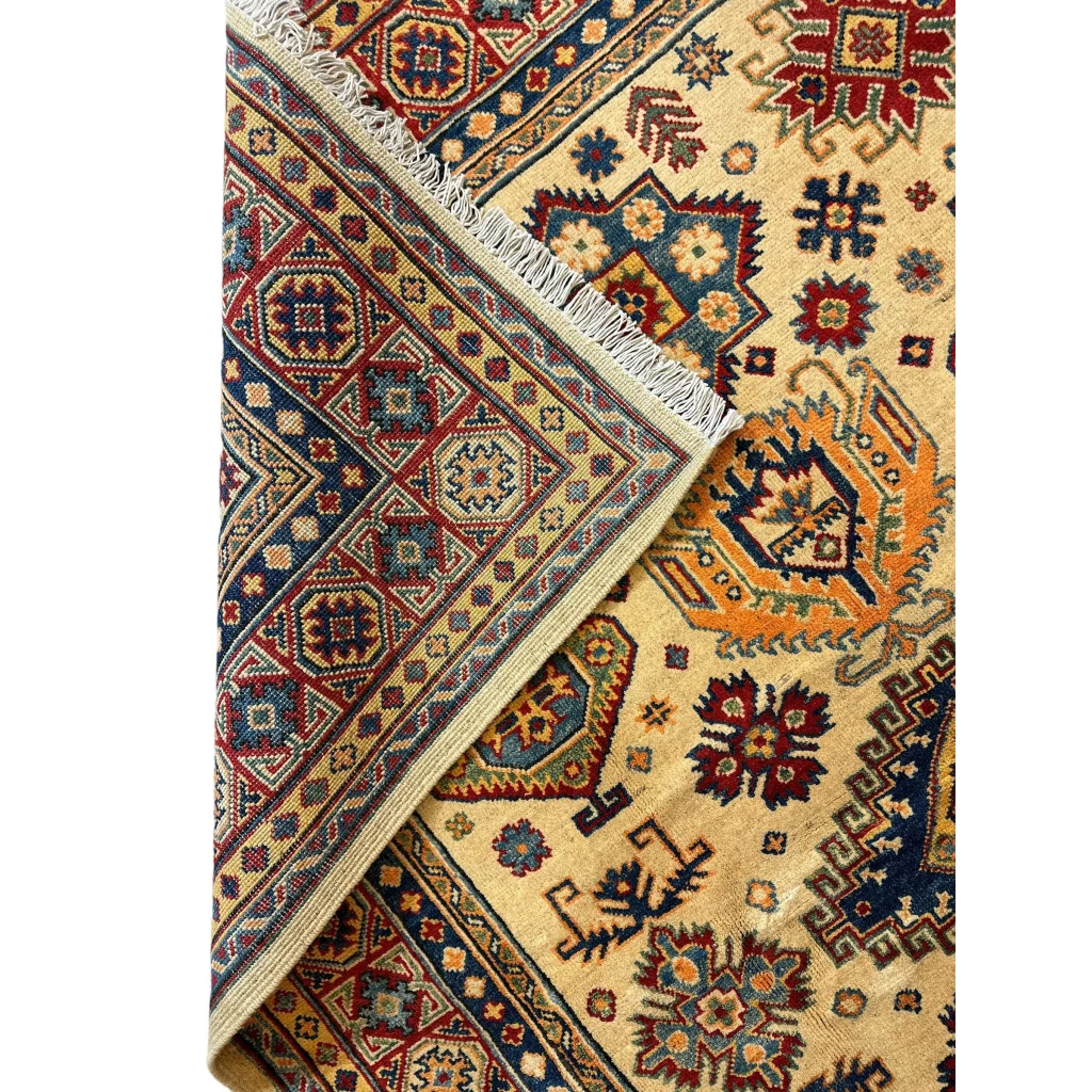 Hand-knotted Afghan Kazak rug in beige with red, blue, orange geometric patterns and fringed edge