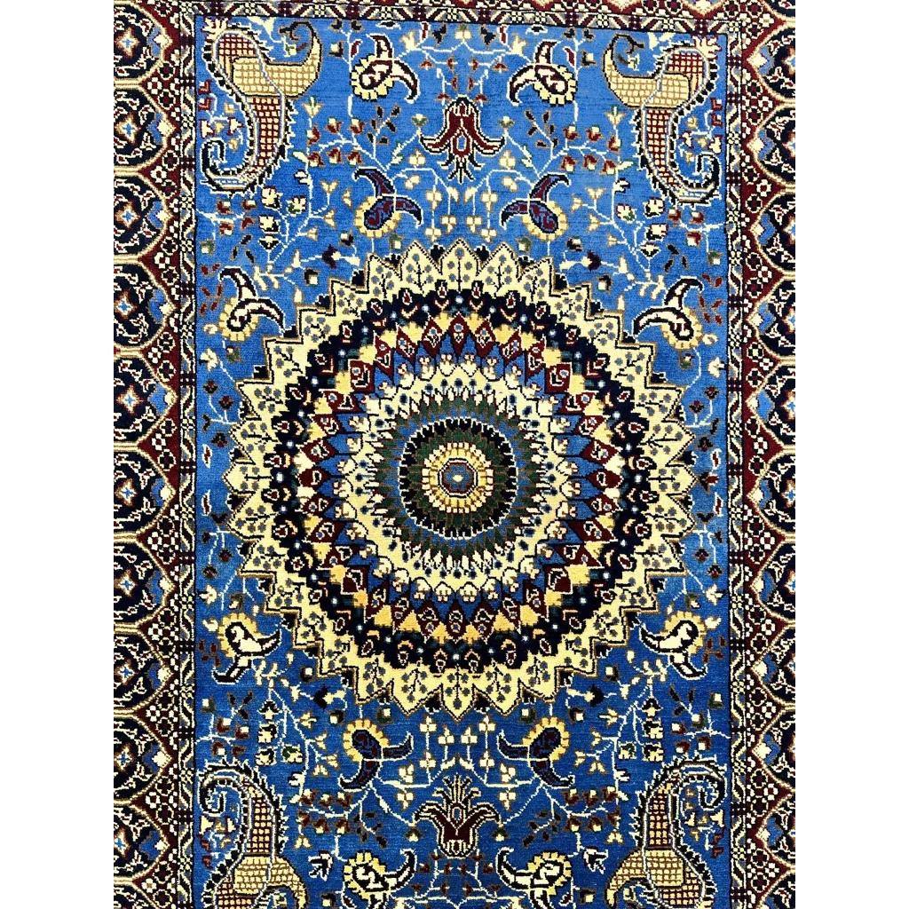 Vibrant blue Parak rug with intricate mandala and paisley design