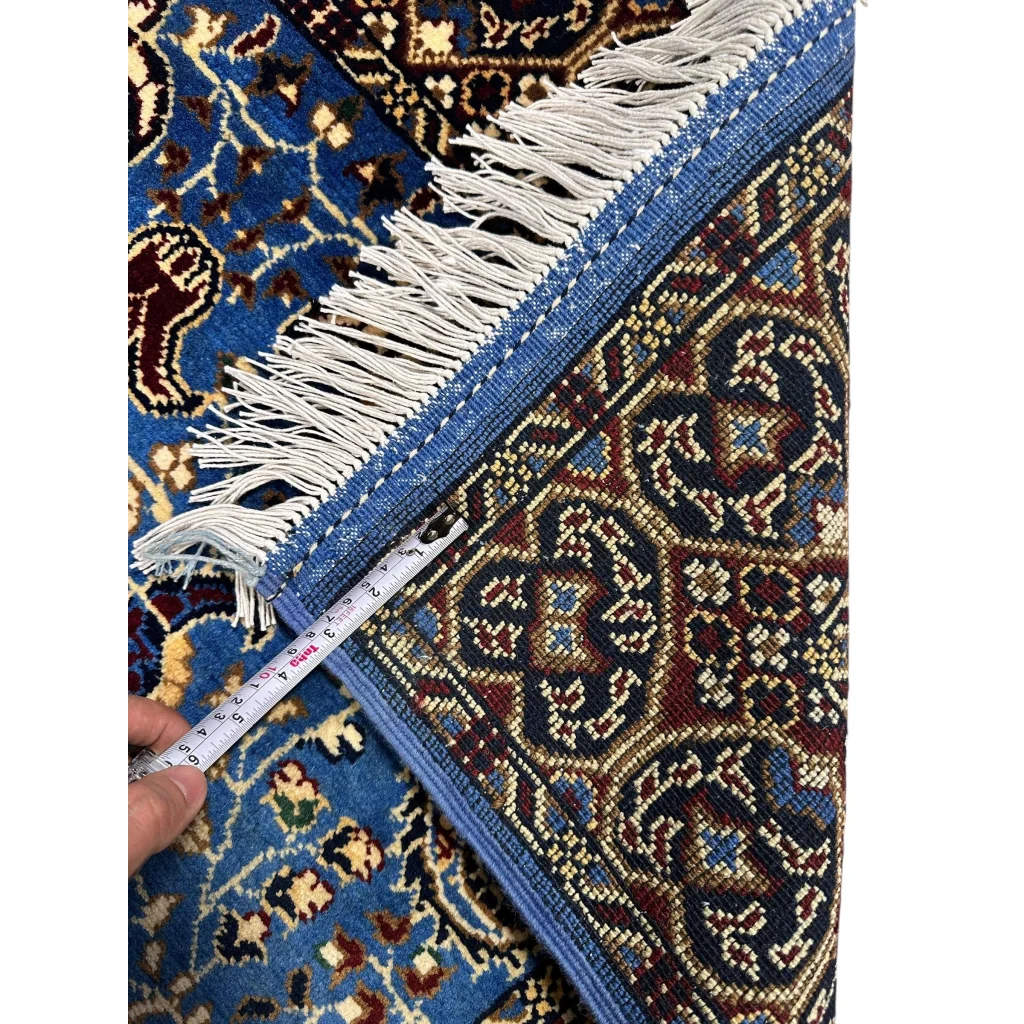 Stunning hand-knotted Parak rug in blue and burgundy with intricate floral mandala design and white fringe
