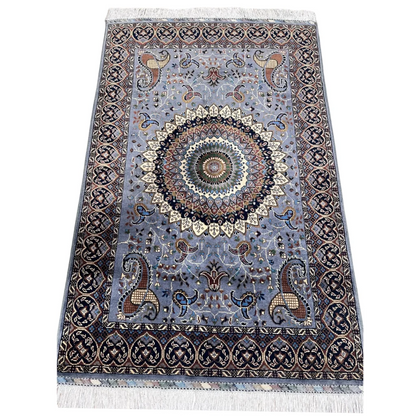 Stunning handwoven Parak rug in light blue with mandala and paisley design