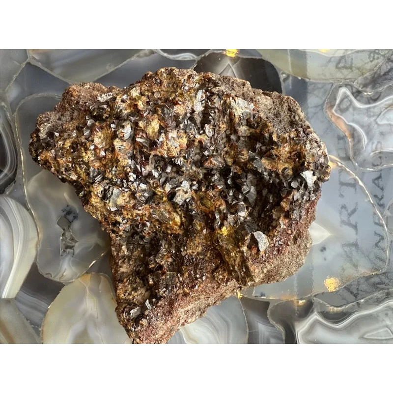 Rugged hessonite garnet cluster from Washington State with golden hues