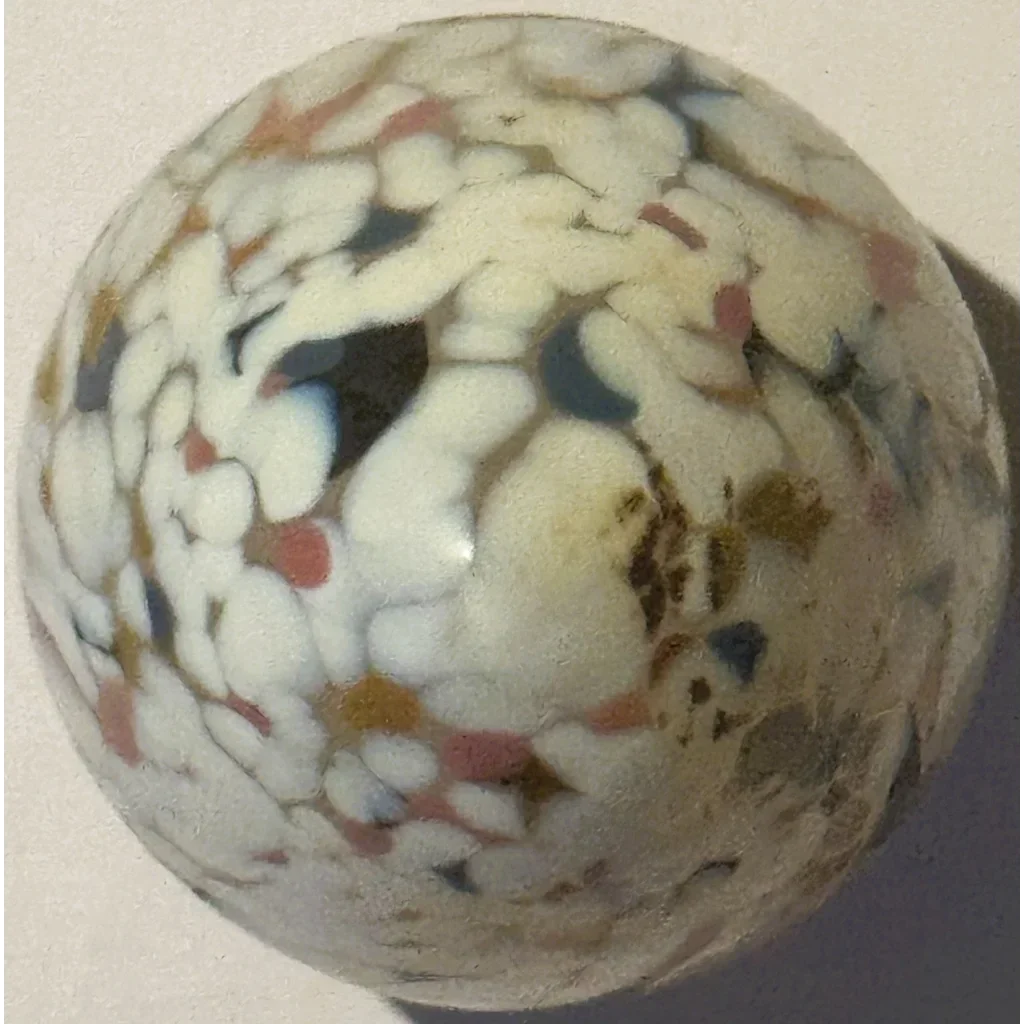 Colorful speckled Kosta Boda glass marble from Stunning Kosta Boda Glass Egg collection