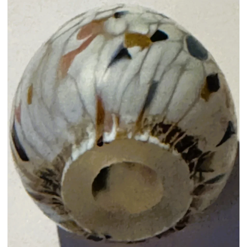 Mottled Kosta Boda glass vase with cylindrical base, perfect for collectors