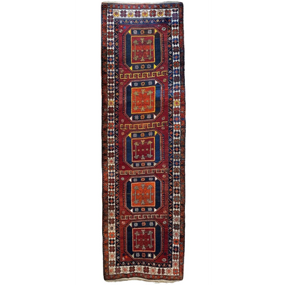 Vintage 1940s Kurdish Kazak runner, full view, bold geometric motifs in reds blues and gold