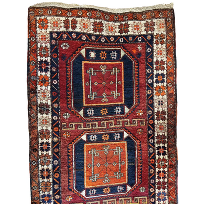 Stunning Kurdish Kazak wool pile geometric motifs runner with intricate patterns