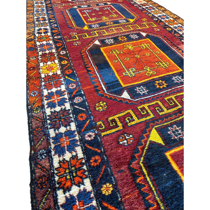 Vintage Kurdish Kazak runner 1940s, vibrant geometric motifs in red blue yellow, pre-loved low pile