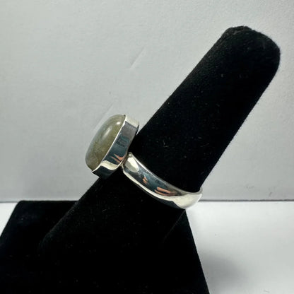 Stunning labradorite ring with iridescent blue-green flash in silver bezel
