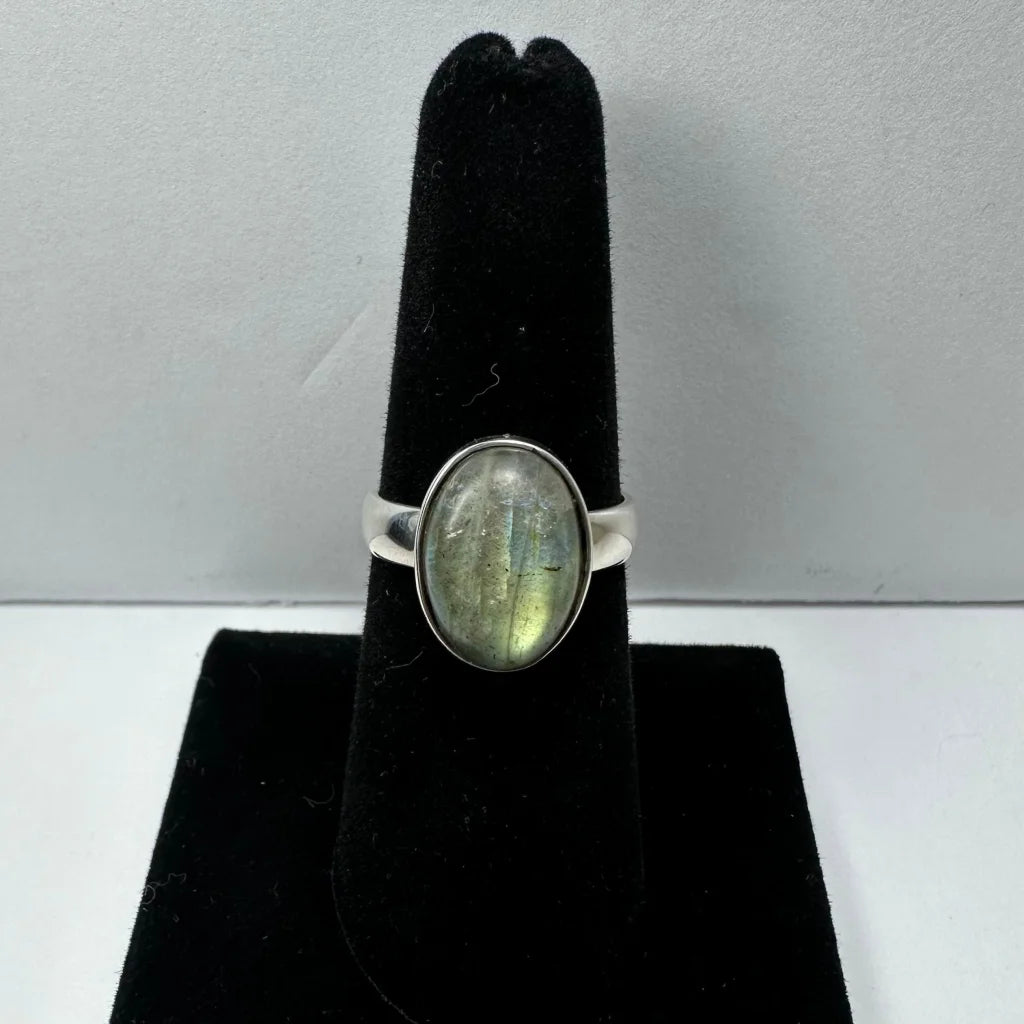 Stunning labradorite ring with oval stone and iridescent blue green flash
