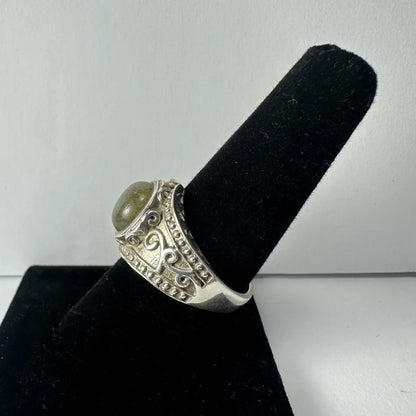 Stunning labradorite ring with iridescent greenish-gray oval stone