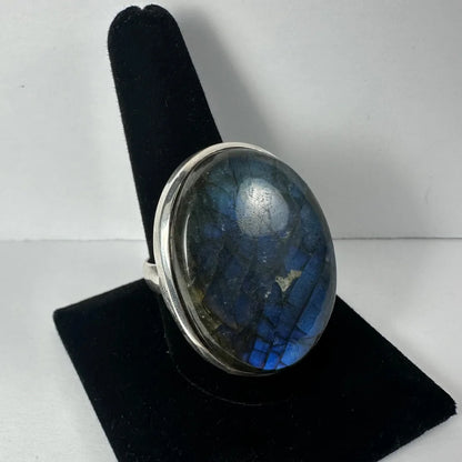 Stunning oval labradorite ring with blue iridescent stone in silver band