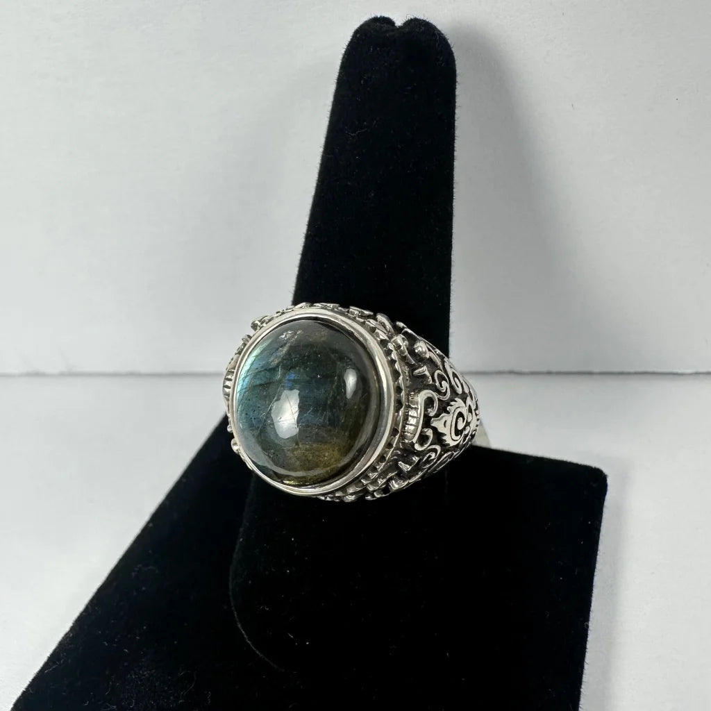 Stunning labradorite ring with ornate filigree and iridescent blue-green cabochon
