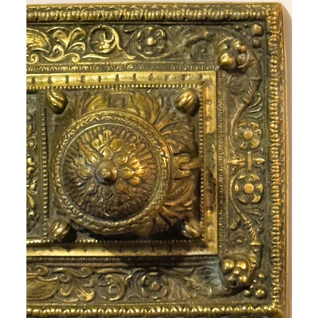 Ornate antique brass plate from late 19th Century double inkwell desk accessory