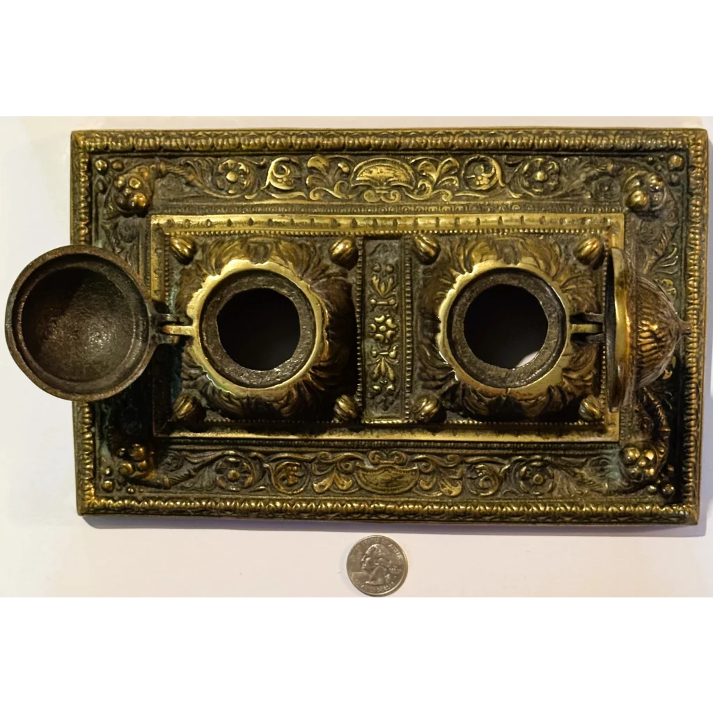 Ornate brass double inkwell as a stunning late 19th century desk accessory