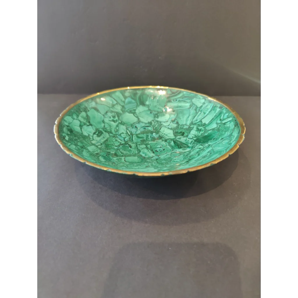 Vibrant malachite decorative bowl with gold rim and swirling patterns