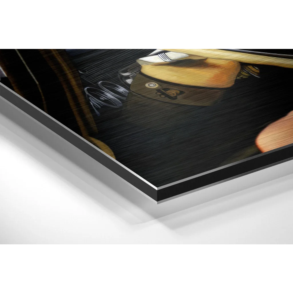 Black glossy laptop screen protector with orange sponge applicator and silver border on brushed aluminium dibond wall art