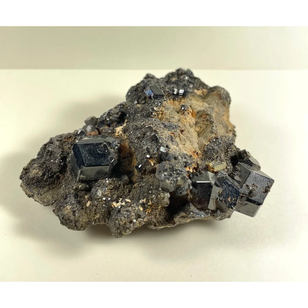Stunning melanite garnet cluster from Mali Africa with cubic blue-black crystals