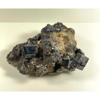 Stunning melanite garnet cluster from Mali Africa with cubic blue-black crystals