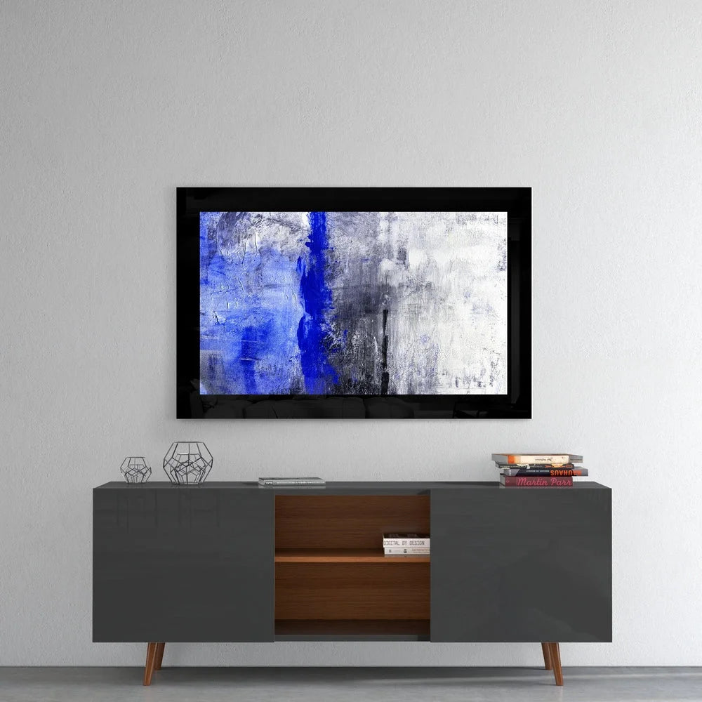 Stunning blue abstract glass wall art in gray tones with black frame