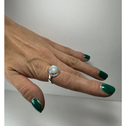 Stunning silver moonstone ring with blue shimmer glow