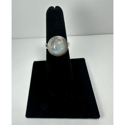 Stunning silver moonstone ring with blue shimmer in bezel setting
