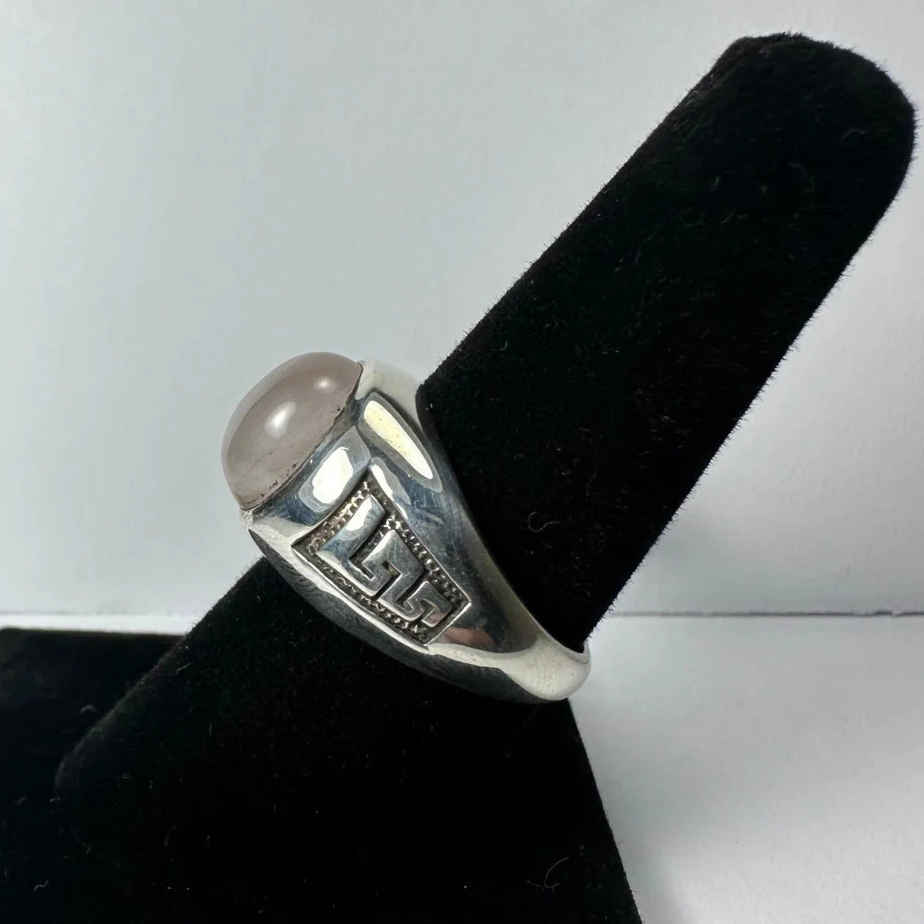 Stunning silver moonstone ring with pink oval stone and Greek key band