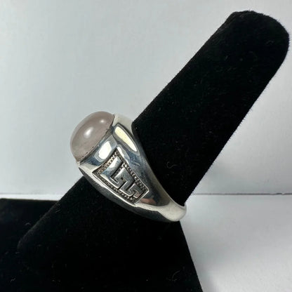 Stunning silver moonstone ring with pink oval stone and Greek key band