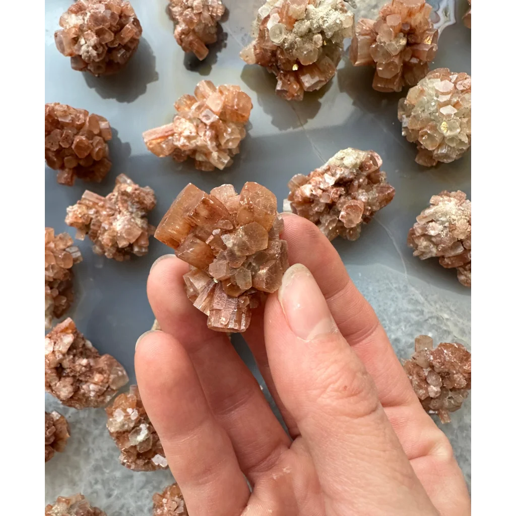 Stunning Moroccan aragonite cluster with peach crystal formations