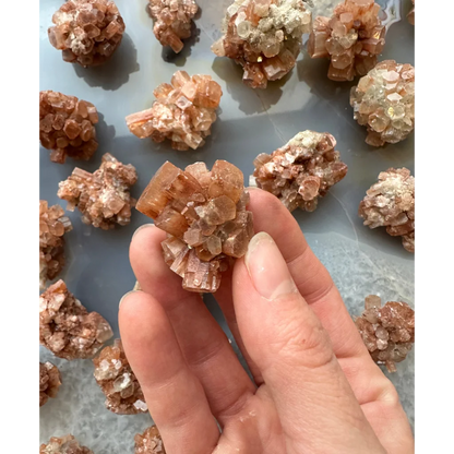 Stunning Moroccan aragonite cluster with peach crystal formations