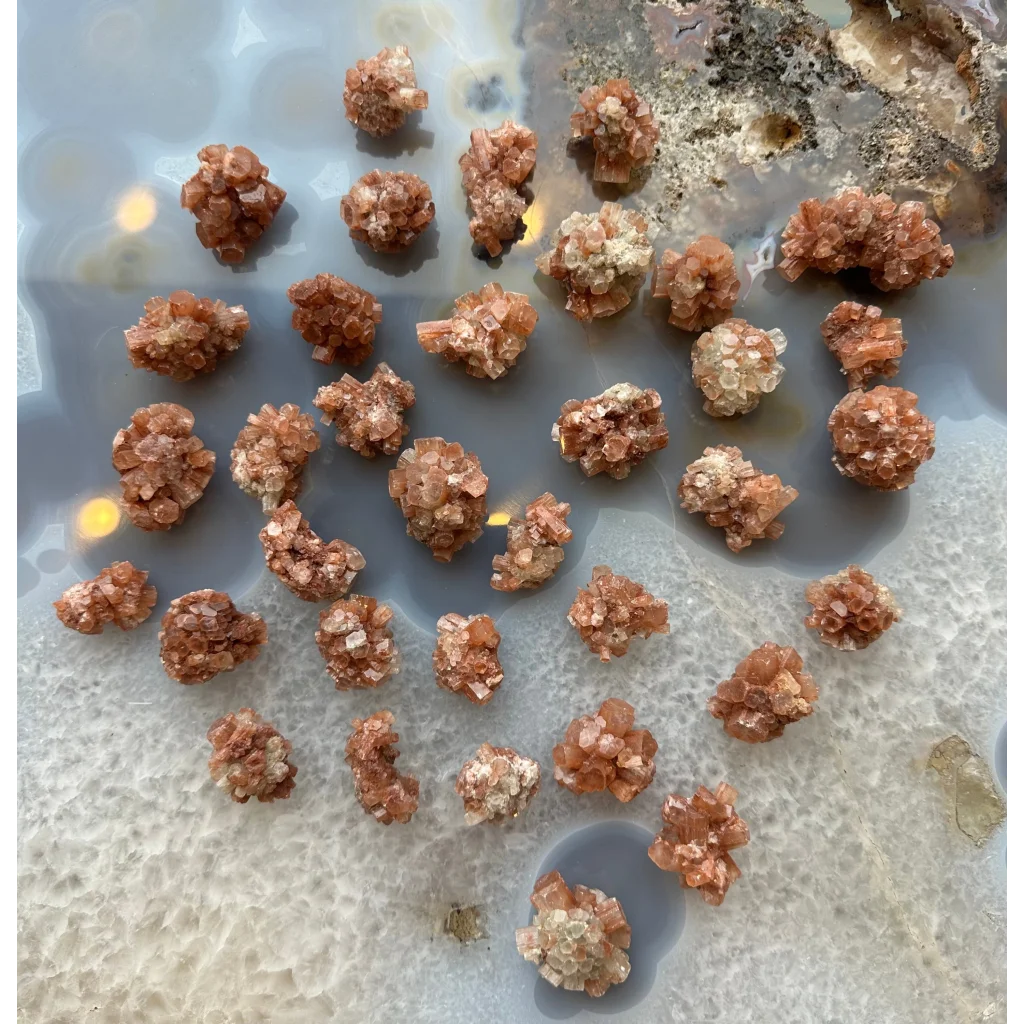 Stunning Moroccan aragonite cluster with peach crystalline formations