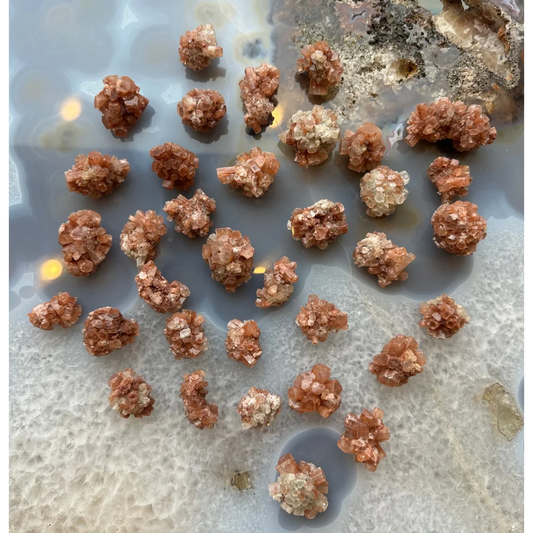 Stunning Moroccan aragonite cluster with peach crystalline formations