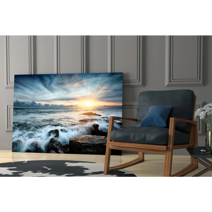 Stunning ocean sunset glass wall art with crashing waves on rocky shores