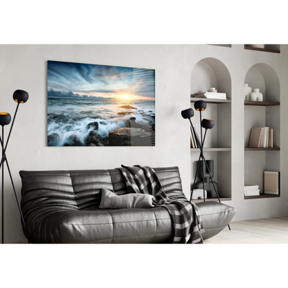 Stunning ocean sunset glass wall art with crashing waves on rocky shores