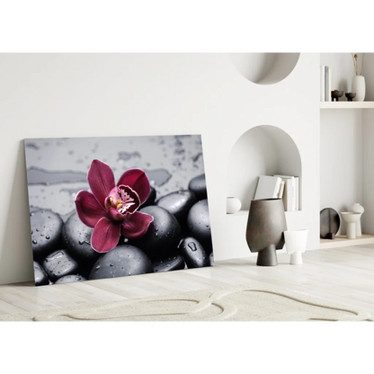 Vibrant red orchid on black zen stone glass wall art