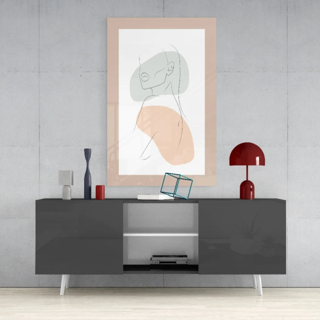 Modern gray sideboard with white legs and open storage under pastel wall art