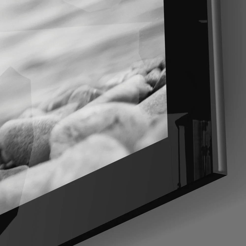 Stunning Pebble Stack monochrome glass wall art with sleek black frame