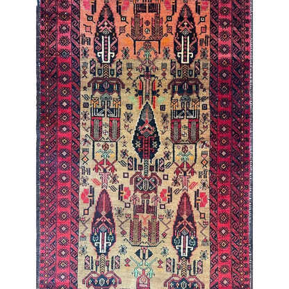 Vintage 1970s Persian Baluch rug with intricate geometric patterns and natural wool pile