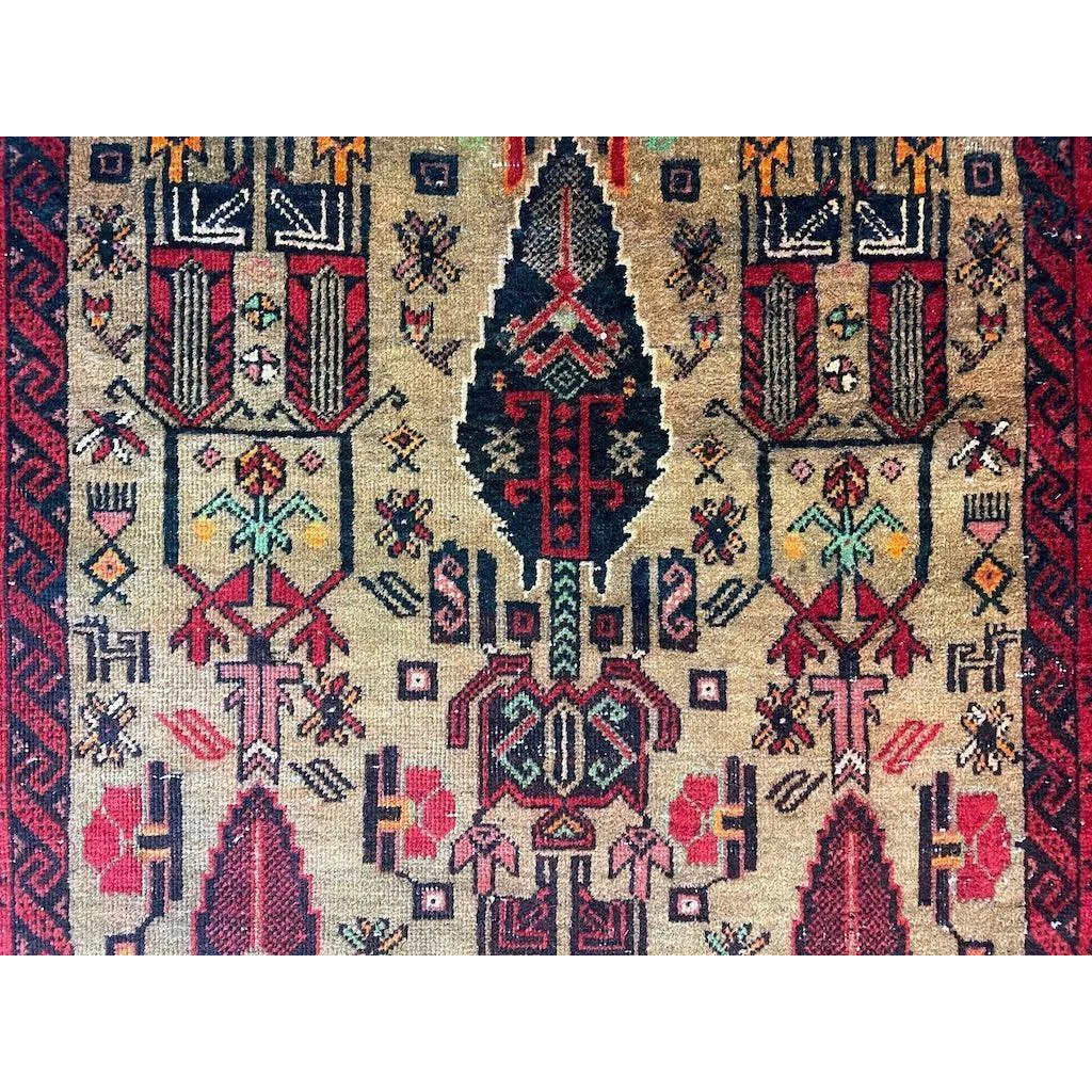 Stunning Persian Baluch rug with wool pile and intricate patterns