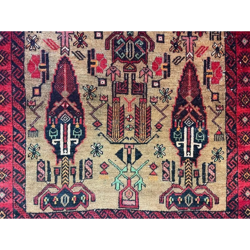 Stunning Persian Baluch rug with intricate geometric floral patterns and wool pile