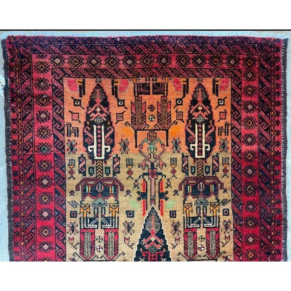 Stunning Persian Baluch rug with intricate geometric motifs and luxurious wool pile
