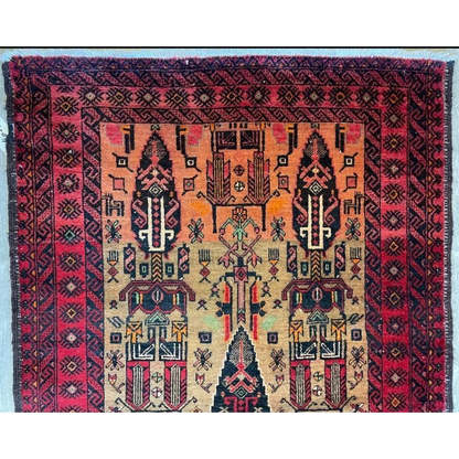 Stunning Persian Baluch rug with intricate geometric motifs and luxurious wool pile